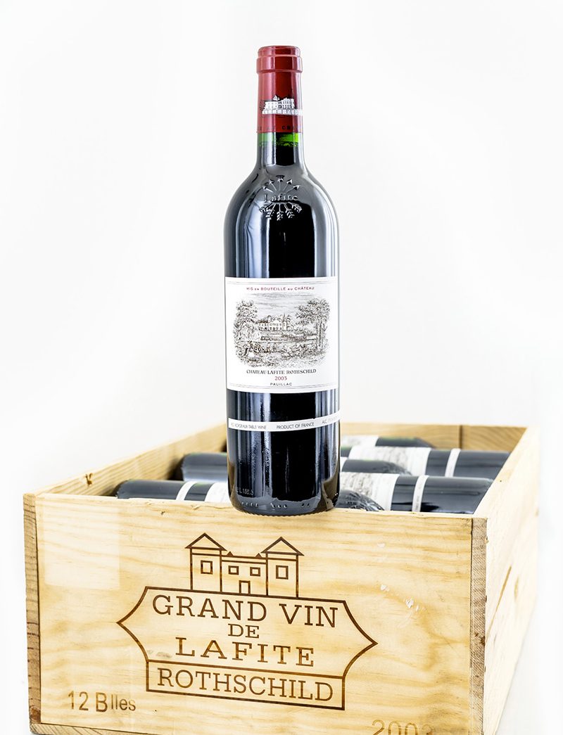 Lot 36: 12 bottles 2003 Chateau Lafite Rothschild in OWC
